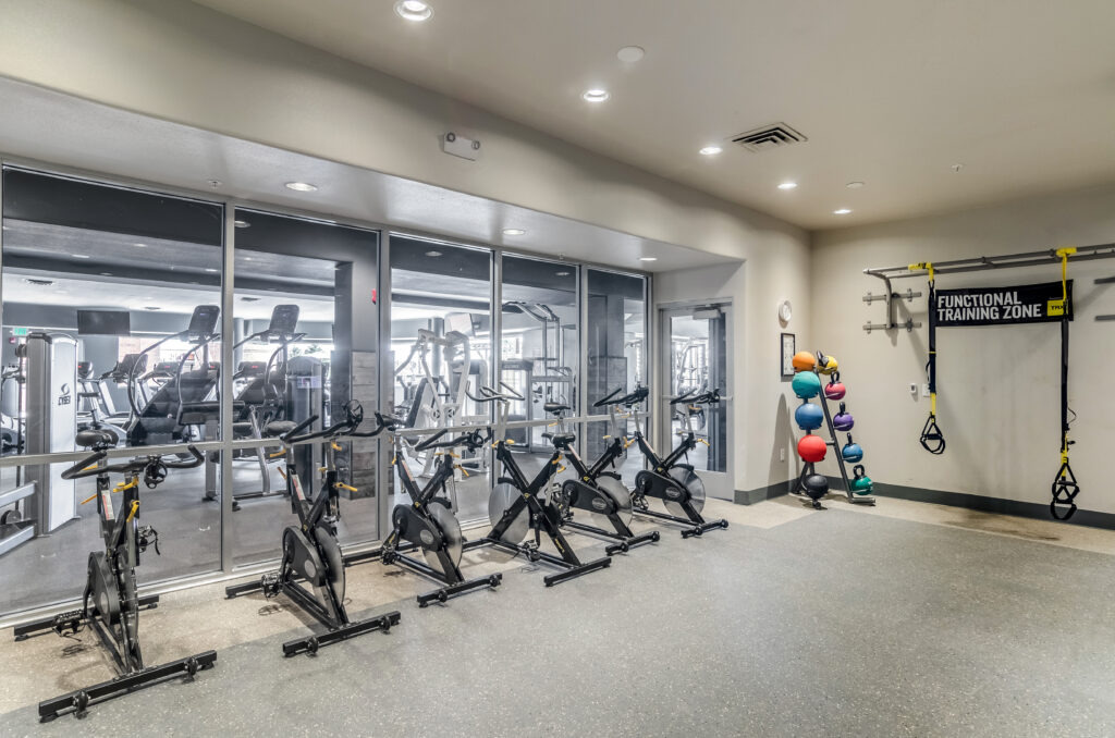 Fitness center with cardio equipment and functional training area