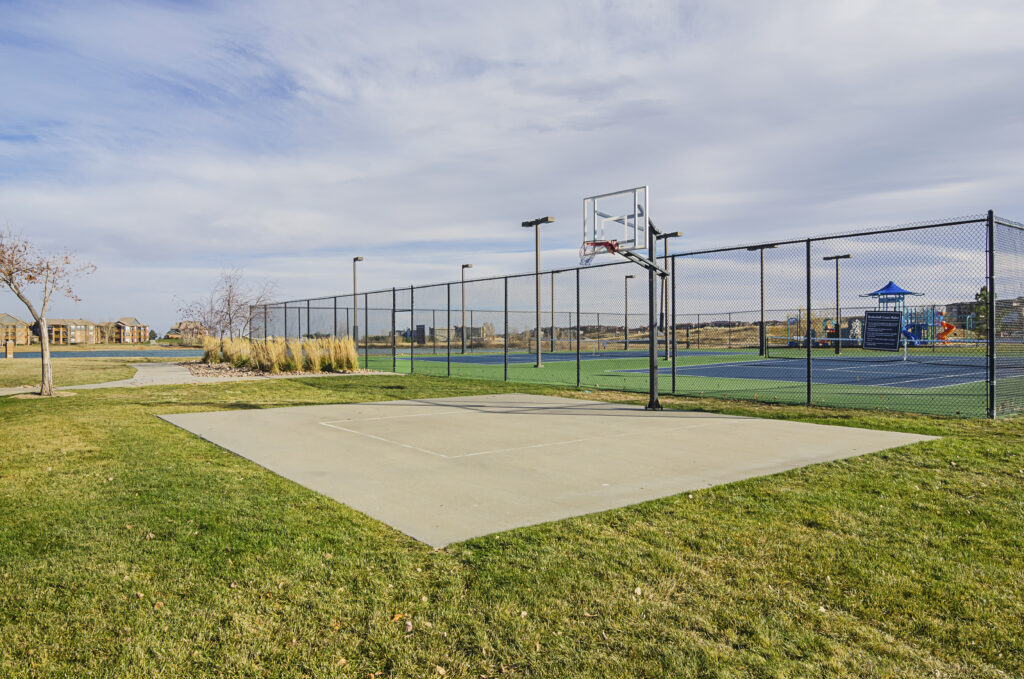 Outdoor basketball and tennis courts by the water